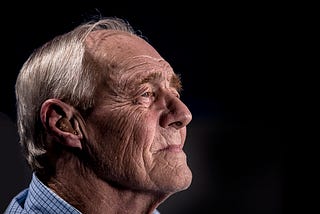 Distressed man worrying about financial problems with real estate