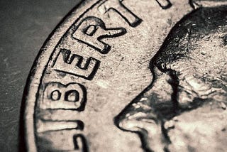 Part of a Franklin D. Roosevelt dime is seen, in a zoomed-in photo.