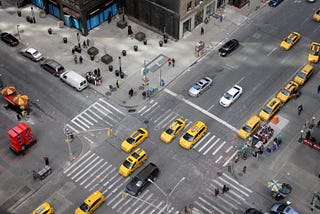 Intersection with cars on all sides