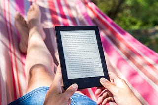 Person on hammock, reading