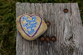 a painted rock for all those we have lost — a rememberance