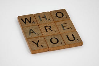 Scrabble squares spelling Who Are You.