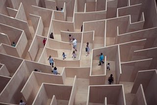 People in the maze searching for an exit