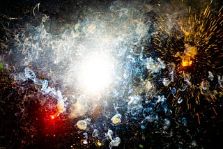 Image of chaotic colors, like an explosion.