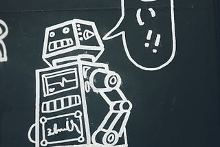 A robot with a speech bubble showing conversational skills.