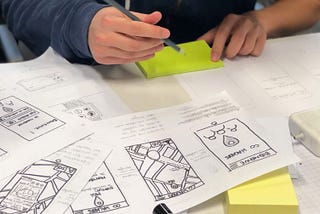 UX Designer making paper prototypes