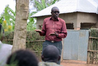 William Musoni during one of his workshops encouraging members of his community to adopt improved WASH practices including handwashing