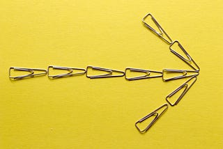 a right-pointing arrow