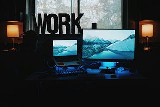 A minimalist workspace setup featuring namy devices and coffee to represent a productive morning routine.