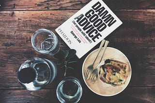 Book and food on table