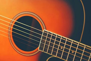 Orange Acoustic Guitar