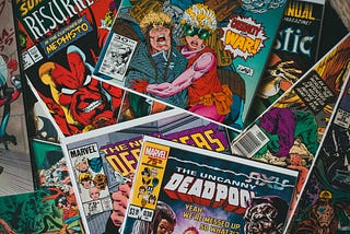 A scattered assortment of comic books.