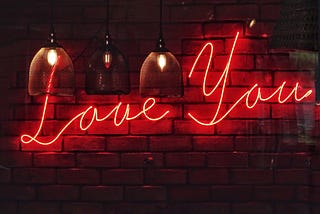 A sign saying Love You