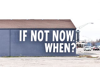 Side of building, says: If not now, when?