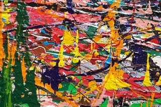 Jackson Pollock like painting with multiple chaotic colors and no pattern.