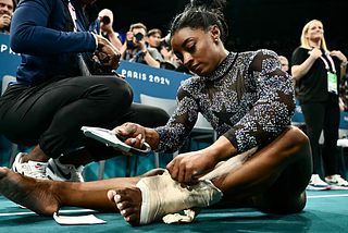 Title: “ Simone Biles Hurts Her Leg in Olympic Gymnastics Qualifying but Finishes 1st Anyway”