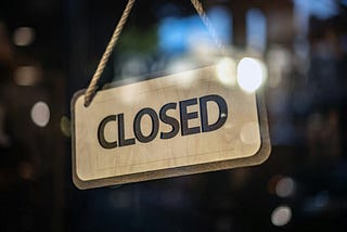 A sign reading “Closed”