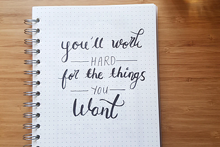 Writing of motivational quote “you’ll work hard for the things you want”