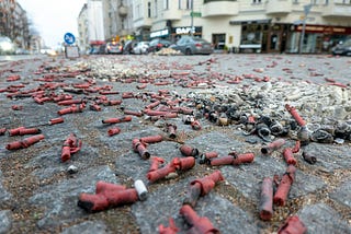 A city street covered in the debris of many explosives