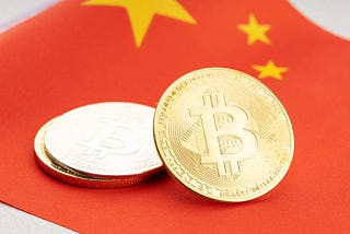 China should reconsider its ban on cryptocurrencies, says former central bank official
