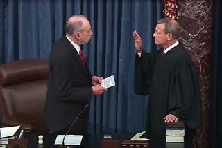 Chief Justice John Roberts swearing in at Donald Trump’s 2020 impeachment hearing