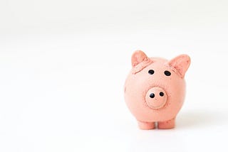 Off centered picture of an old piggy bank.