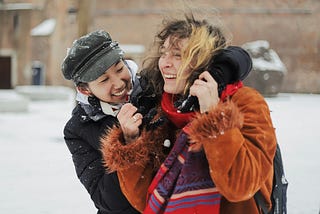 Two women best friends laughing