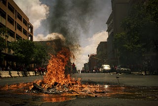 A city boulevard burning