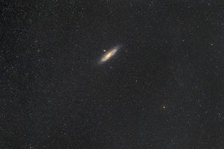 An image of a galaxy alone in the outer space.