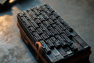 Old printing press letters sitting on a table