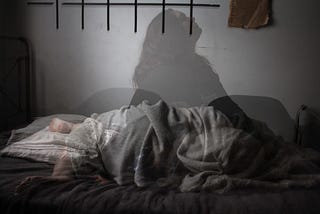 Silhouette of woman alternating between sleeping and sitting up in bed.