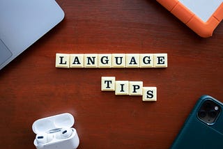 Scrabble tiles spelling Language tips