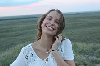 A happy, positive woman smiles