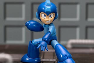 Mega Man: 1/12 Scale Authentic Action Figure with Collectible Package | Image