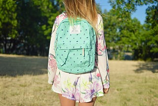 A child wearing a backpack.