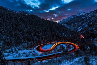 Time lapse of a mountain road at night
