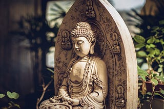 A stone sculpture of Buddha.