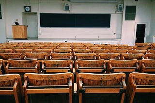 Brown and Black Wooden Chairs Inside Room