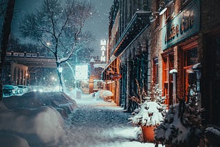 A small town covered in snow. It looks idyllic. It feels like Hades blew the chill of the grave straight into your bones.
