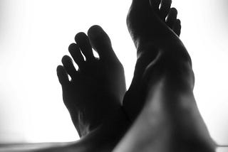 monochrome persons feet