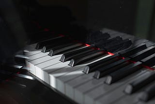 A closeup of a piano keyboard.