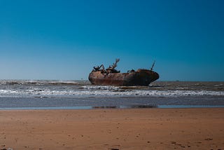 A shipwreck off a beach