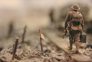 A lone soldier walking alone.