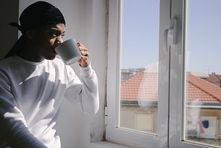 A man drinks coffee alone and stares out his window. It’s about as fun as you’d think.