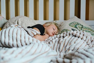 Photo of small child sleeping