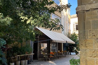 Image shows a cafe/bar in an old street in Nicosia, Cyprus