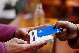 Woman paying with a credit card