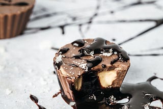 Delicious cupcake with melting chocolate
