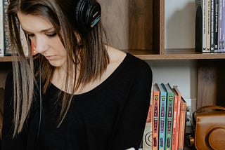 Young woman with headphones on