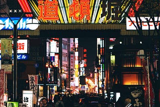 Neon lights up Japanese entertainment district at night